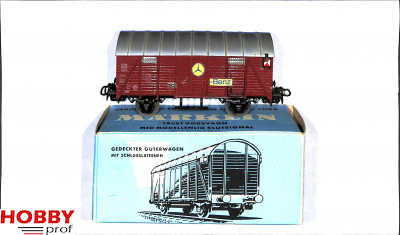 Closed goods car with tail lights